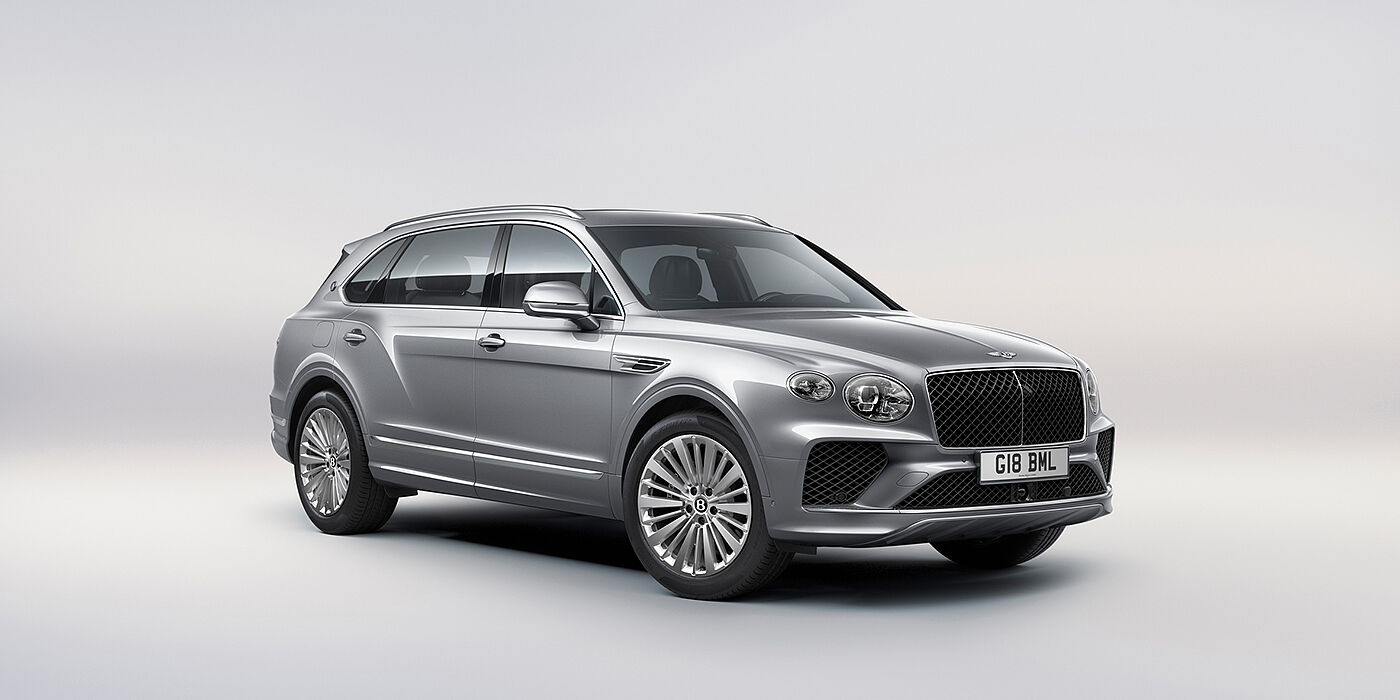 Bentley Lima Bentley Bentayga Extended Wheelbase luxury SUV front three quarter view in Moonbeam paint with 21 inch five spoke painted wheels