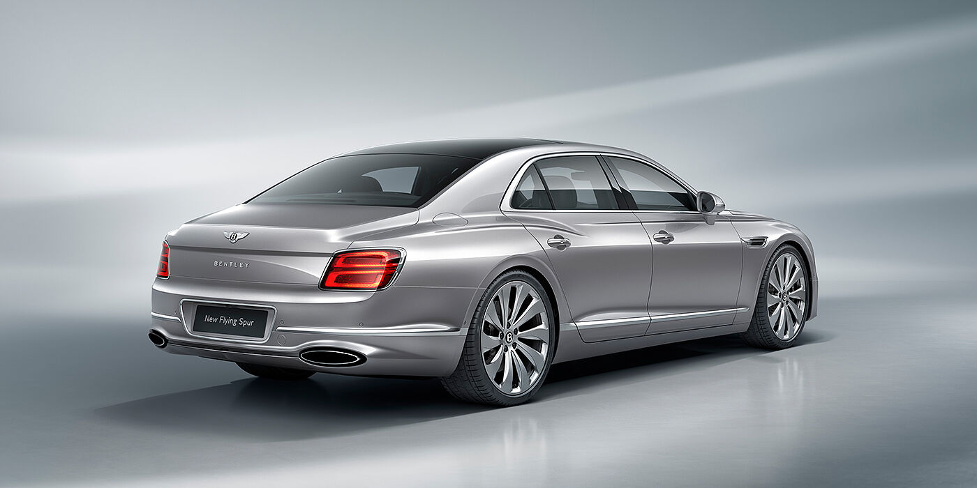 Bentley Lima New Bentley Flying Spur sedan rear view in Silverlake paint with ten spoke wheels and chrome matrix grille