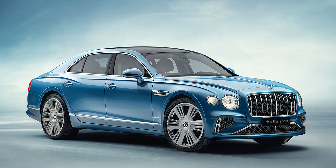 Bentley Lima New Bentley Flying Spur Azure sedan front view in Light windsor blue by Mulliner paint with 22 inch Azure wheels and chrome exterior details